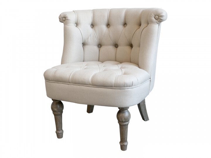 A very grand armchair made with Oak wood and adorned with a beautiful buttoned linen fabric. It looks good in most situations, as a single armchair, as a pair, ot together with the matching sofa.