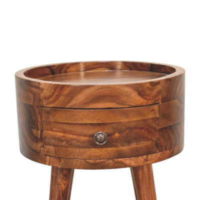 Rounded sheesham wood bedside cabinet featuring rich brown tones, visible natural grain, single central drawer.