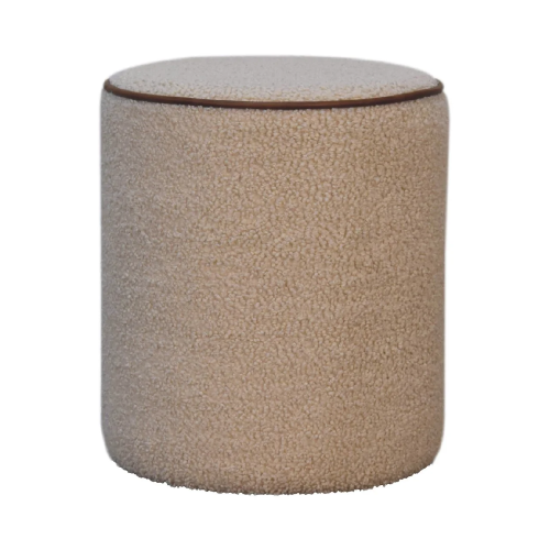 Cream bouclé round footstool with textured upholstery and stitched edge detail