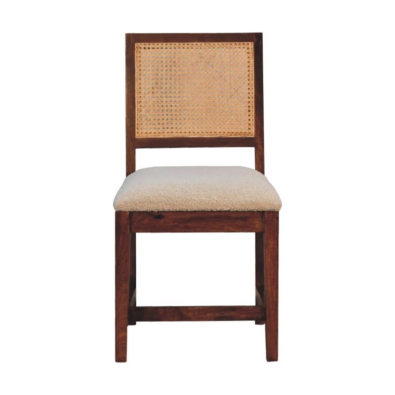 Gainsborough Boucle Rattan Dining Chair Gainsborough Bouclé and Rattan Dining Chair
Blending traditional craftsmanship with gentle comfort, the Gainsborough dining