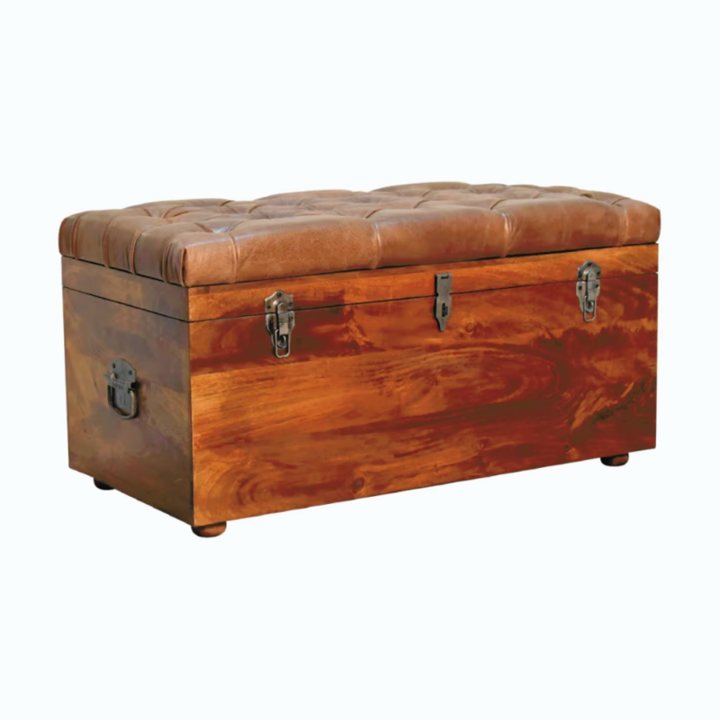 Never got enough space? This chest is so useful for storing spare bedding, towels or just about anything.
With its hinged top, it is so easy to get to anything you've stashed away, and it's so attractive in a chestnut finish and padded brown leather top, which is also handy for sitting on to do those bedroomy things!
It is built from sturdy mango wood and crafted by hand. Front and side view shown.
90 cm wide, with a height and depth of 45 cm. 