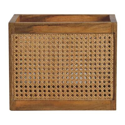 An elegant storage box with a solid mango frame, finished in an oak effect, which looks marvellous with the rattan panels.