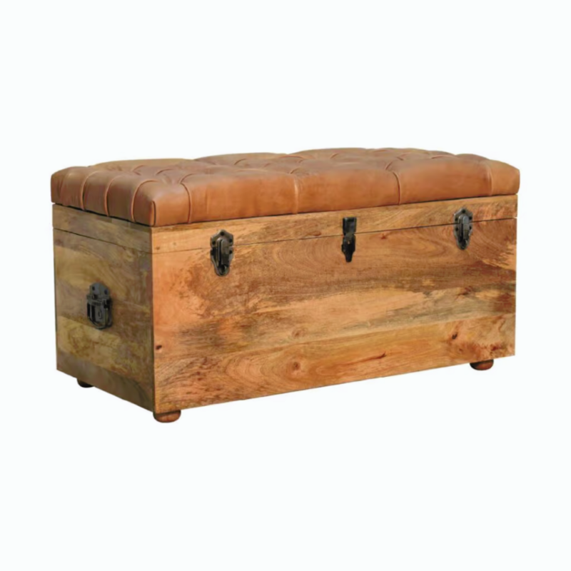Never got enough space? This chest is so useful for storing spare bedding, towels or just about anything.
With its hinged top, it is so easy to get to anything you've stashed away, and it's so attractive in an oak shade finish and padded tan leather top, which is also handy for sitting on to do those bedroomy things!
It is built from sturdy mango wood and crafted by hand. Front view shown.
90 cm wide, with a height and depth of 45 cm. 