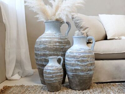 Breeze Vases
Light Blue/Opal Jug with Gold horizontal pattern
All Three - different Sizes situated in a home