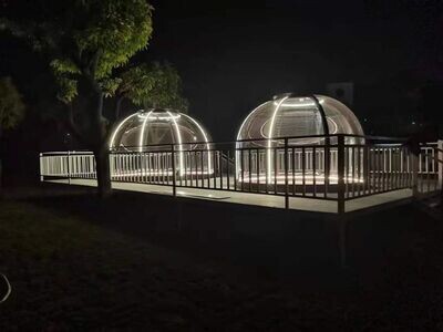 This is our top-of-the-range outdoor dome and you cannot buy better. This view displays how wonderful the Dome can be when lit at night, and we can supply furniture and soft furnishings to complete the job!
Just read the full description and you will see that it is simply the best to be found.
We have supplied many hotel and leisure companies with this Dome, throughout the UK and Europe, and it is also popular in glamping sites and private gardens.