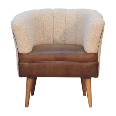 Quality and style combine to make our cotton boucle and tan leather chair so luxurious. 