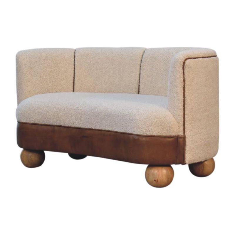 An interesting view of this Boucle sofa in brown and cream, showing the ball feet and the style of those strong ball feet.