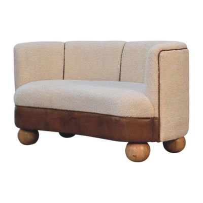 An interesting view of this Boucle sofa in brown and cream, showing the ball feet and the style of those strong ball feet.