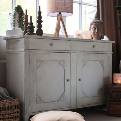 The two drawers and two doors are in classic style and are beautifully finished.