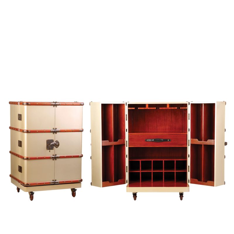 Polo Club Bar - Champagne The Polo Club Bar is an exquisite bar in the style of a travellers trunk. Open up the beautiful champagne finished trunk and you are met with all the compartments that you need for a 'bar-on-the-go'. However, this bar trunk will be more than equally at home in a dining room or lounge setting. Many have been bought for a guest room or bedroom, where it is sure to impress.