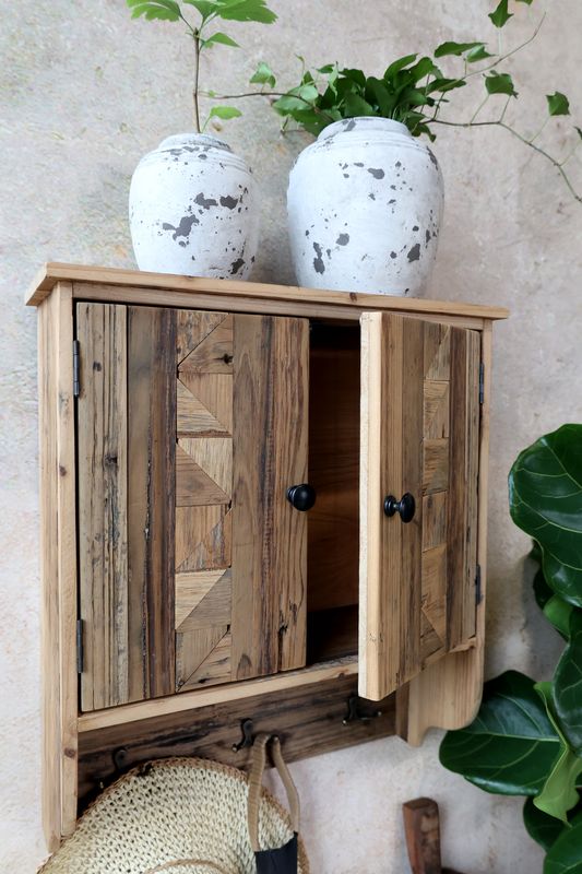 If you want a wall cupboard that's not just practical, our AZTEC cabinet comes adorned with interesting carvings and woodworking detail. It is made from fir wood, much of which is recycled, 
Size; Height 48 x Length 42 cm x Depth 16 cm.