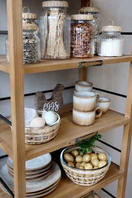 This is an extremely useful shelf unit in a room setting, built with five fir wood shelves.
Each shelf has iron bars at the sides and back to ensure nothing slips off, and metal detail tags.
And for handy mobility, there are good sized wheels so you can safely move the unit to a more convenient position when you need to.
Dimensions: H 157 x L 59.5 x W 35.5 cm