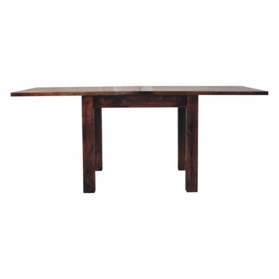  Here we have a beautifully designed extendable table, in a California Walnut finish, which doubles in length in a couple of seconds. Crafted by hand, and built with solid mango wood, it is a sturdy table which has a 90 cm square top, but when those guests arrive, with a couple of flips of the wrist, it transforms into a 180 cm tabletop! This image shows the table fully extended to 180 cm length.
Height 76 cm