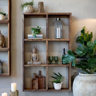 Grimaud Display Shelving Unit large.
Made in Dark Recycled Aged Wood.
Set as a Rectangle making Six Square display spaces.
Lifestyle Image showing unit dressed in an earthy toned room