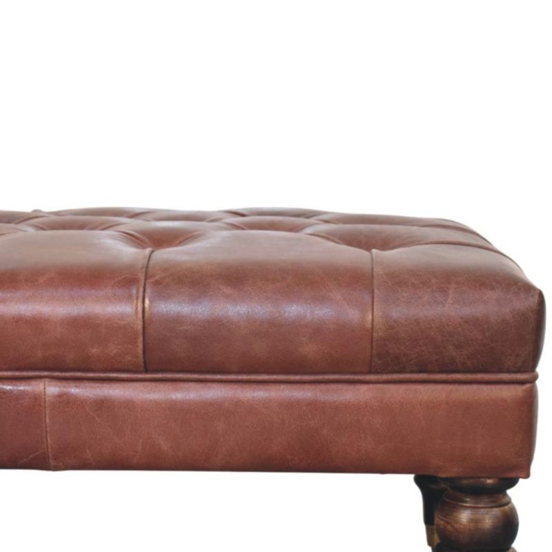 A beautiful buttoned brown leather bench padded top 