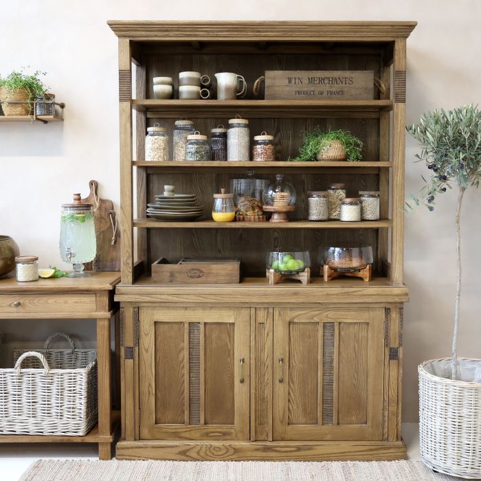 Wooden dresser with a classic design, featuring multiple drawers for storage & a timeless, elegant finish.