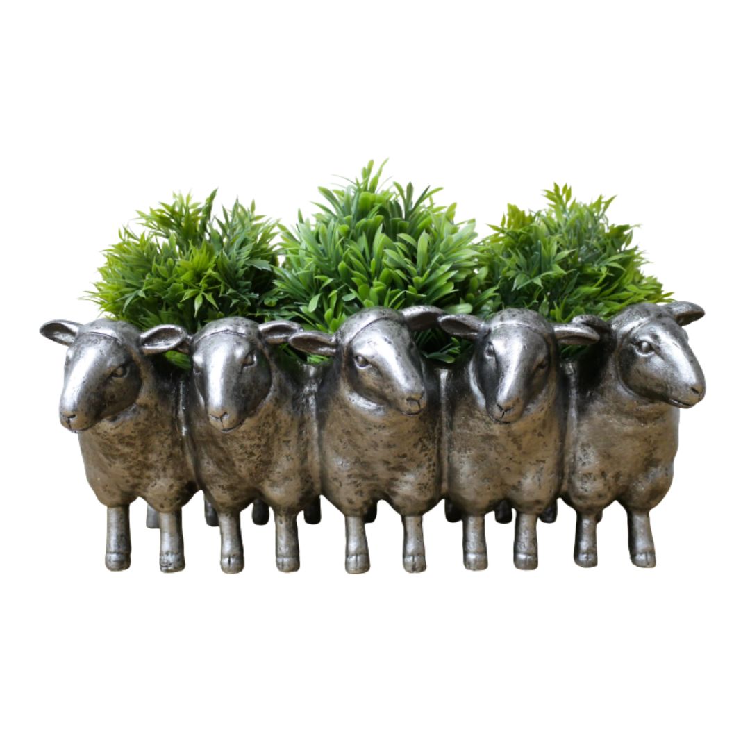 Baasil Sheep Planter.  Row of Silver finish Sheep creating an indoor planter.