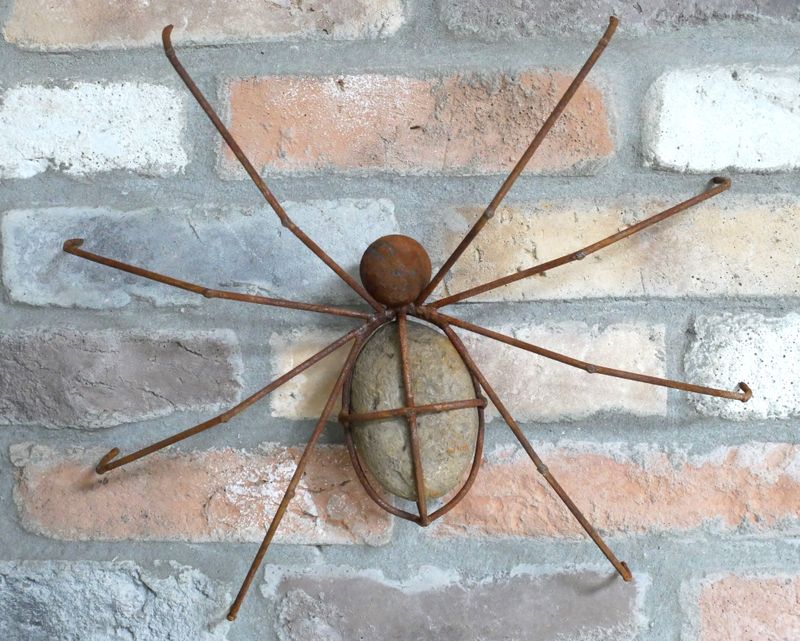 Garden Wall Art. Rusty Metal Spider with Pebble Body.