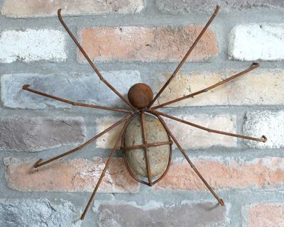 Garden Wall Art. Rusty Metal Spider with Pebble Body.