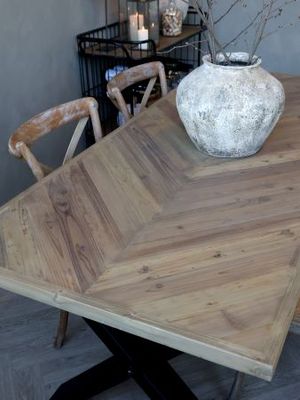 Herringbone Rectangular Wooden Dining Table with X Leg ends.