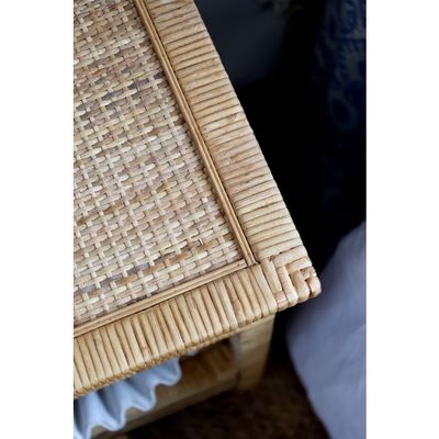 Rattan bedside table with two drawers and open shelf, woven detail, natural finish and slim legs.