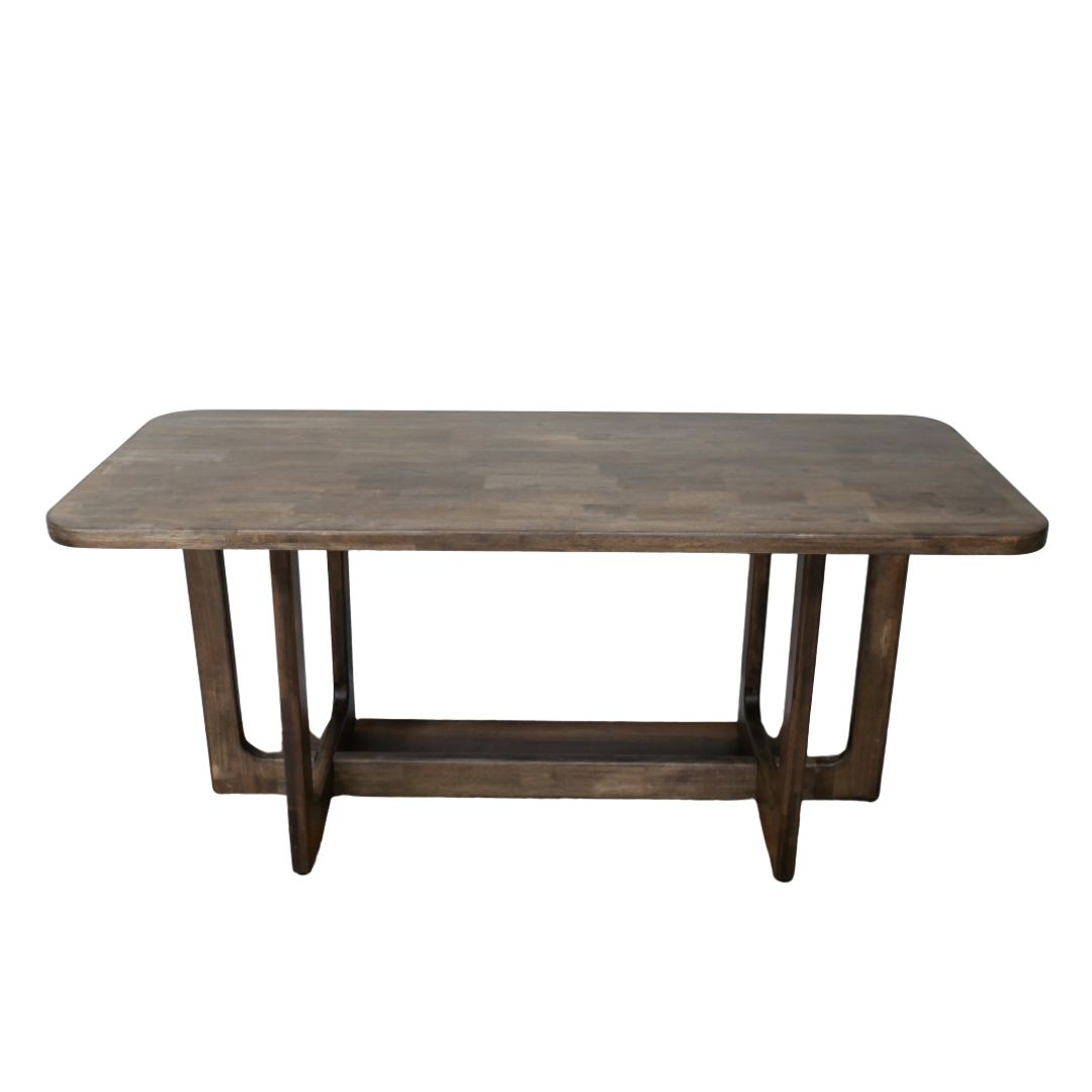 Rectangular wooden dining table with rounded corners, warm finish and sturdy open-frame legs with a low stretcher