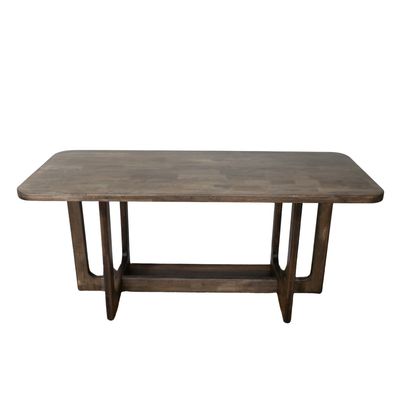Rectangular wooden dining table with rounded corners, warm finish and sturdy open-frame legs with a low stretcher