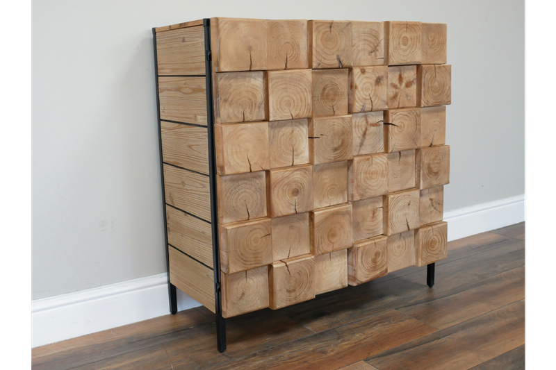 Forest Bloc cupboard with textured solid wood block front, natural grain patterns and black metal frame.