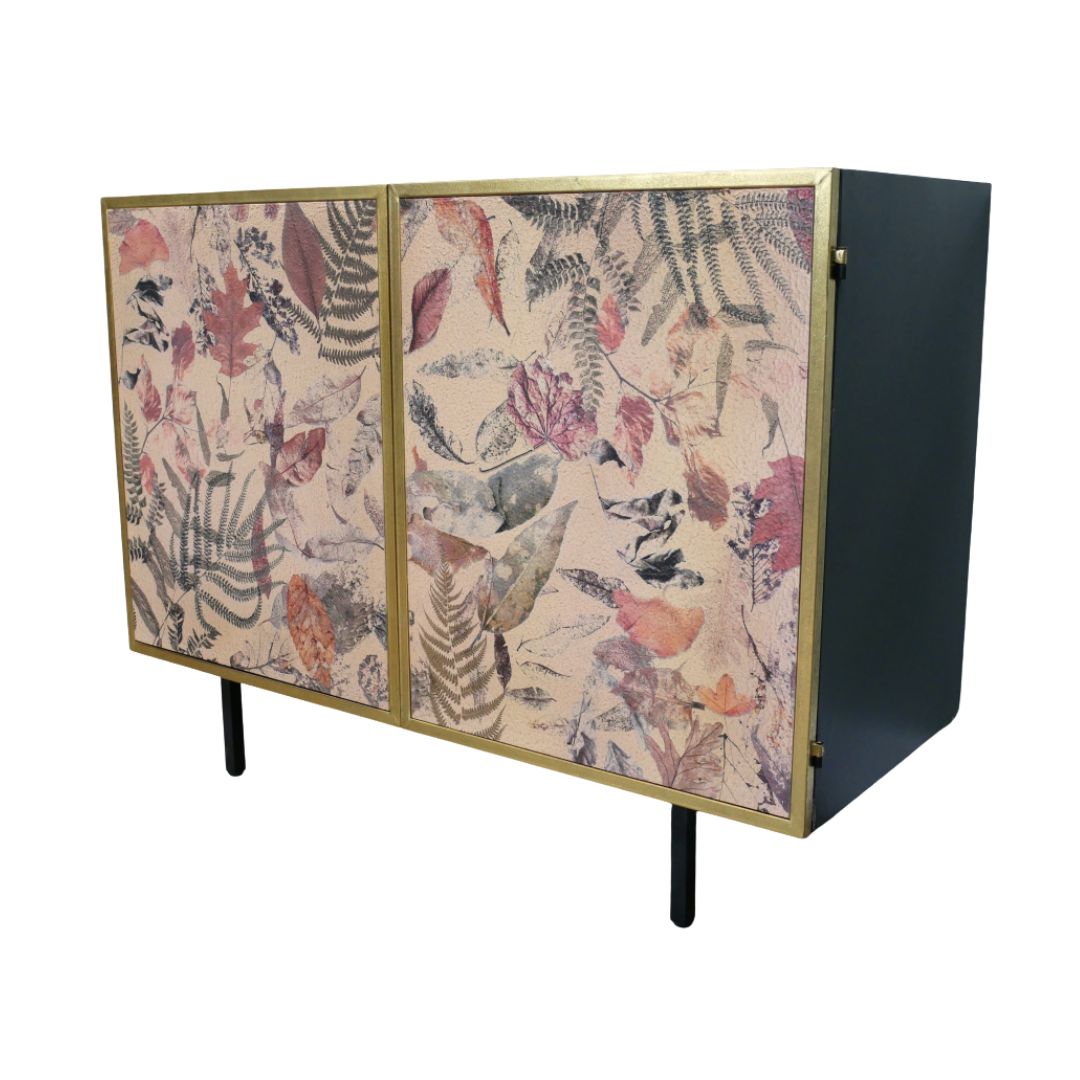 Chateau Leaf Cabinet Botanical cabinet featuring leaf and fern artwork, gold trim and slim black legs for elegant storage.