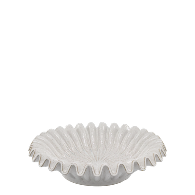 Darya - Set of Two Bowls Large white ceramic shell bowl with scalloped edges, filled with seashells and displayed on a wooden coffee table.