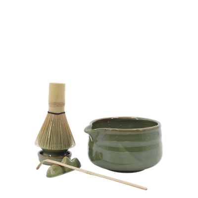 Japanese matcha tea set with handcrafted ceramic bowl, bamboo whisk, scoop and whisk holder for an authentic tea ritual.