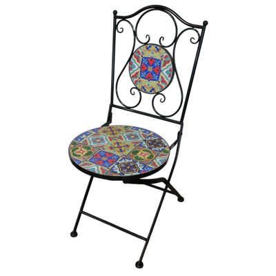 Colourful mosaic garden bistro set with round table and two folding metal chairs featuring vibrant ceramic tile designs.