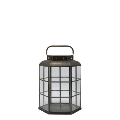 Set of two hexagonal metal and glass lanterns in antique bronze finish with carry handles, shown in small and large sizes.