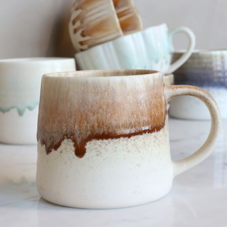 Honey Oat: Easy Morning Mug with warm caramel drip glaze, creamy speckled base and rounded handle.