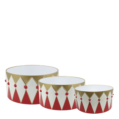 The Little Drummer Christmas Display Tubs – Set of Three Three large Christmas drum decorations in cherry red, cream and brass, with mirrored tops and harlequin patterns.