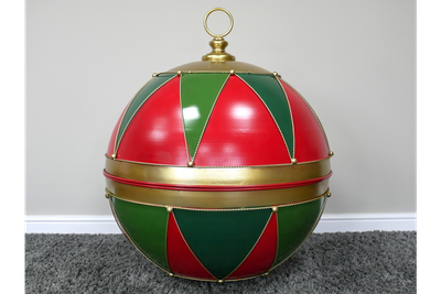 Oversized red and green harlequin Christmas display bauble with gold-toned edging, a broad centre band and top ring.