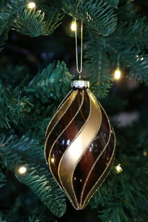 Three glossy mocca Christmas baubles in assorted shapes, decorated with sweeping gold ribbons and fine glitter edging.
