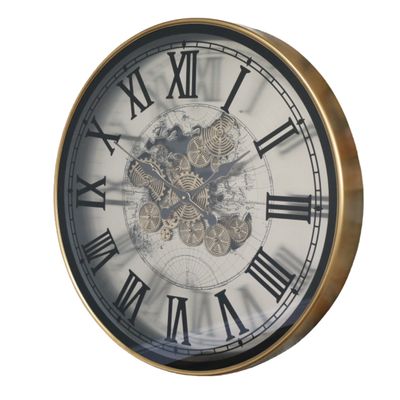 Extra-large round clock with an antique-brass frame, Roman numerals, a world map and decorative central cogs.
