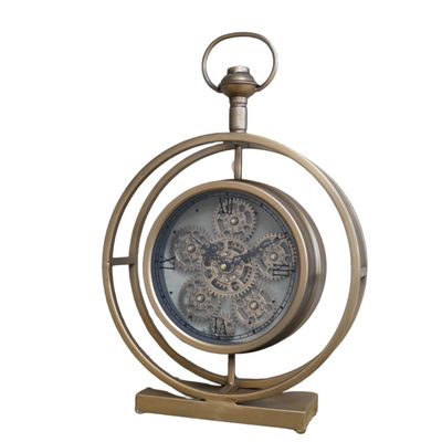 Antique-brass table clock with an open circular frame, Roman numerals and decorative visible cogs.
