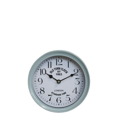 Round blue-grey wall clock with a white face, black numerals, vintage lettering and black hands.
