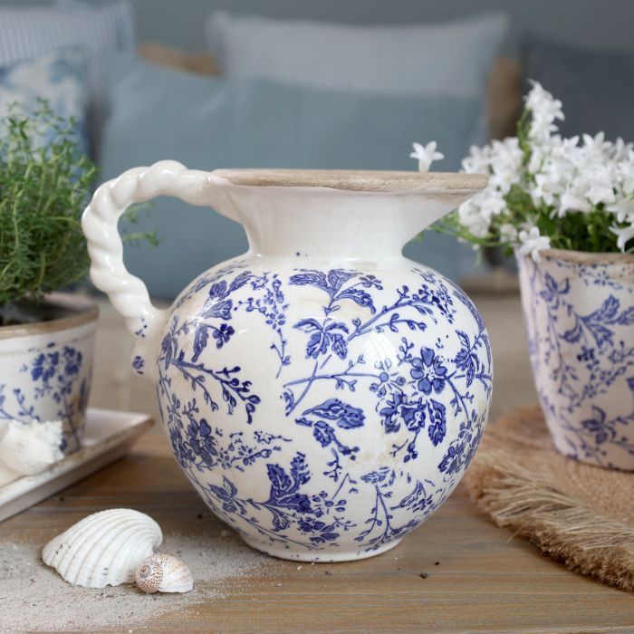 Delicate indigo flowers and winding foliage inspired by the quiet beauty of country hedgerow Jug