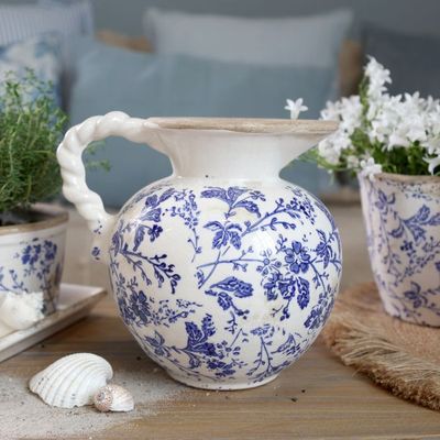 Delicate indigo flowers and winding foliage inspired by the quiet beauty of country hedgerow Jug