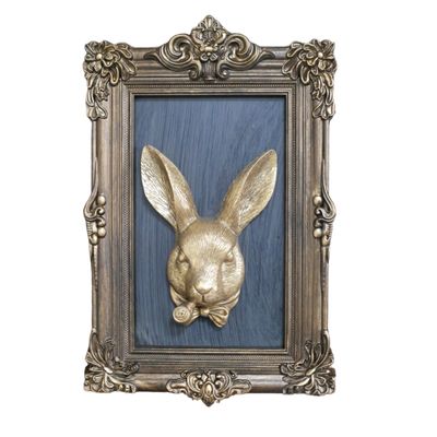 Ornate antique-style frame with a gold hare portrait on a deep blue background.