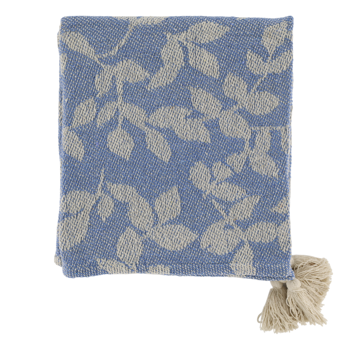Blue woven throw featuring an ivory leaf and vine pattern, textured finish and decorative cream tassels at the corners.