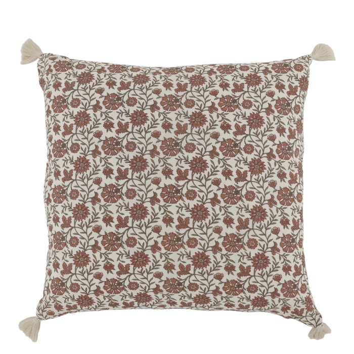 Square cream cushion with mocca floral patterns, contrasting botanical designs on each side and cream corner tassels.