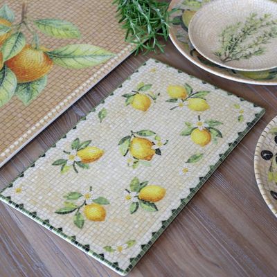Rectangular Chartres mosaic tray with yellow lemons, white citrus blossoms, green leaves and a cream tiled background.