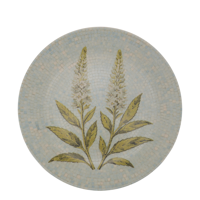 Round Chartres mosaic tray with two white flower spikes, olive green leaves and a pale blue and cream tiled background.