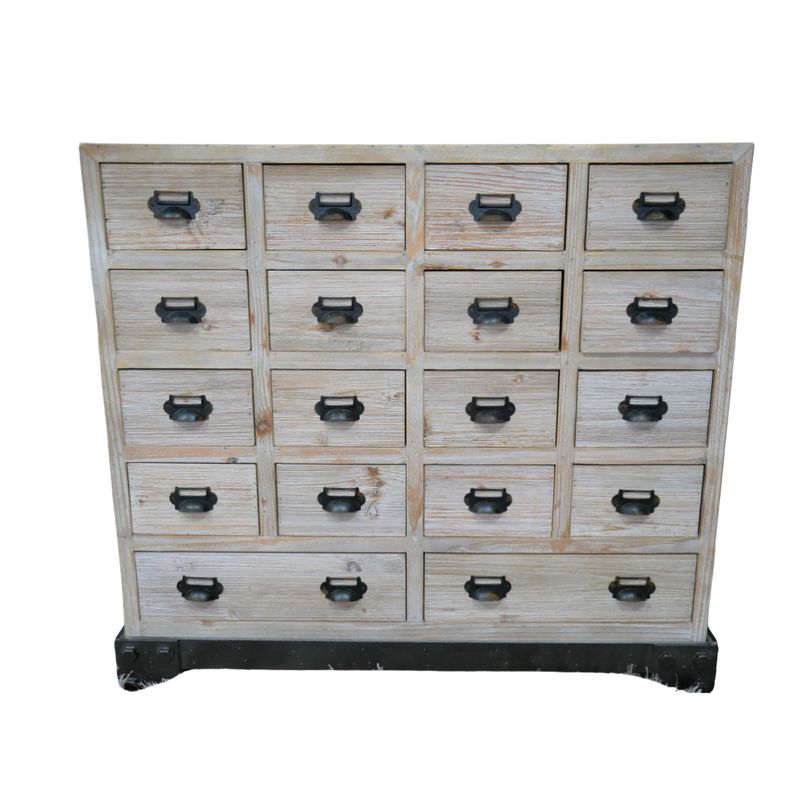 The Atelier reclaimed wood cabinet with sixteen drawers, distressed pale timber finish and dark metal label-holder handles.