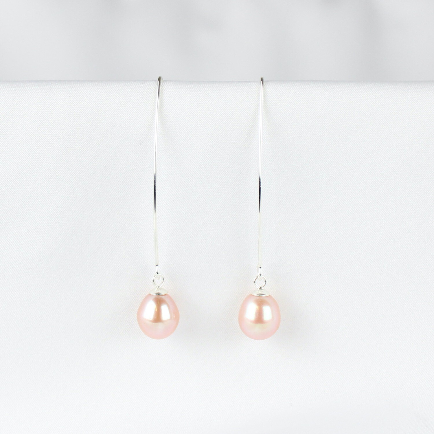 Rosa perle ørekroge