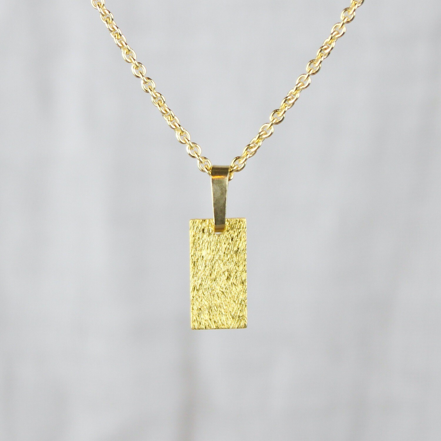 Børstet plade halskæde